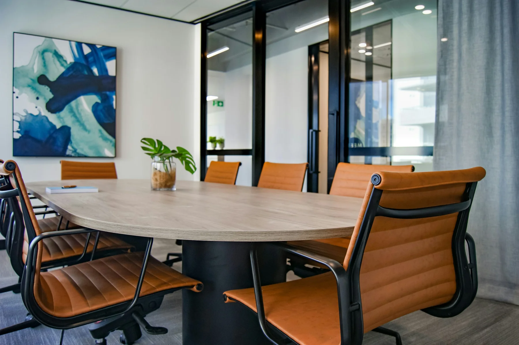 Illustrative bright meeting room with a conference table